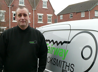Brian the Locksmith stood in front of Van