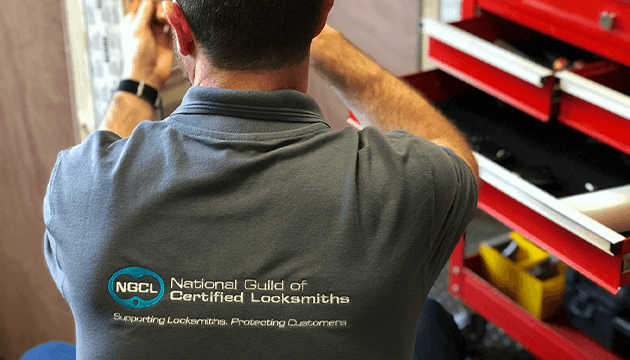 NGCL Locksmith working on door